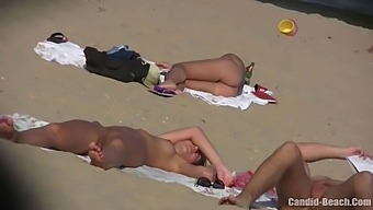 Amateur Couples Get Intimate On The Beach In Candid Video