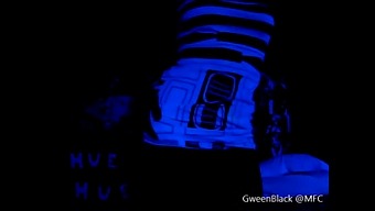 Dancing Provocatively With His Buttocks In Darkened Ballroom Setting