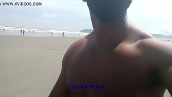 A Lot Of People On The Beach During Their Early Stroll
